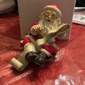 Festive Santa Claus Figurine stocking hanger in Red and Gold